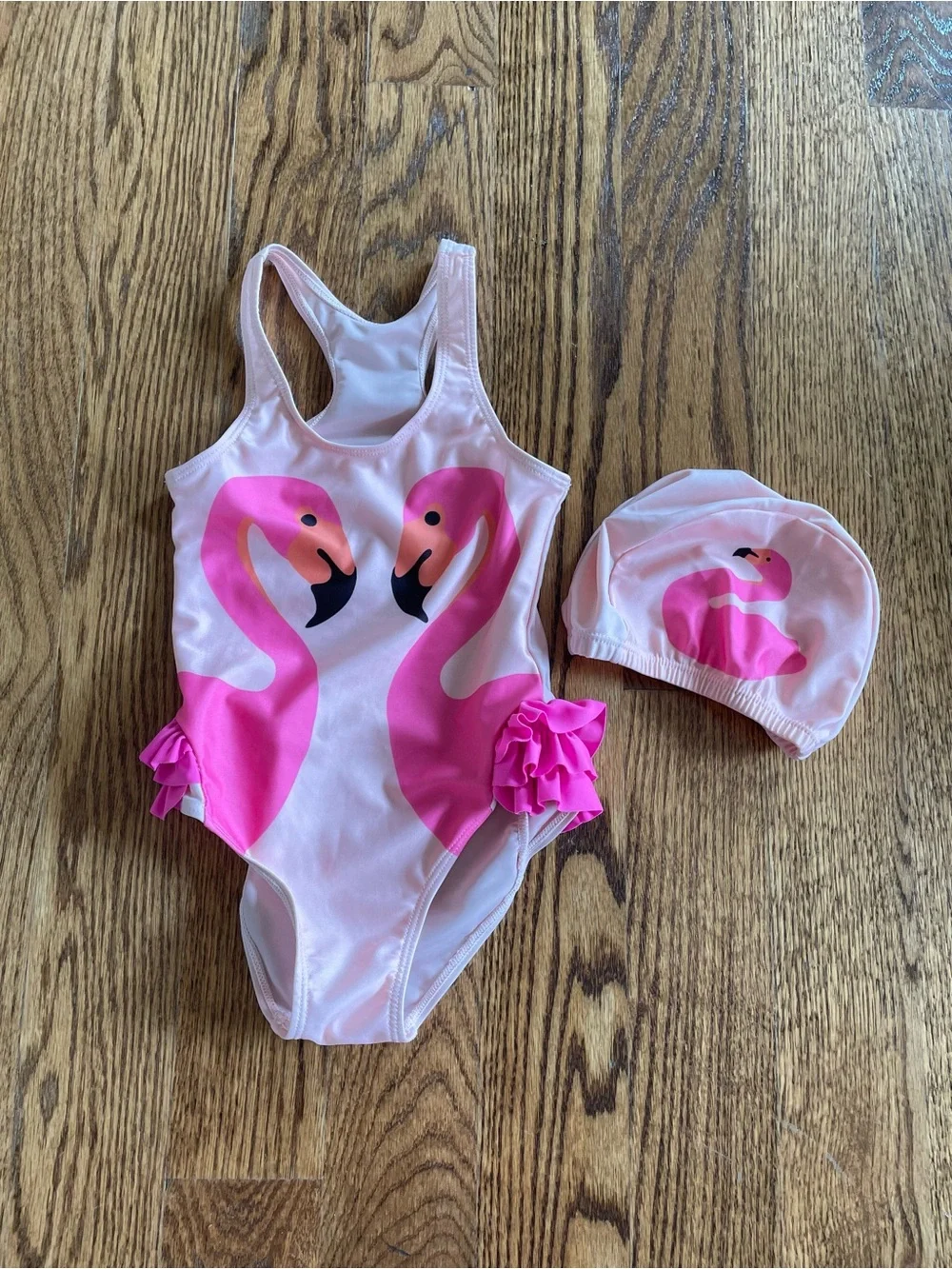 Qvete pink flamingo one-piece swimsuit with swim cap, size 8